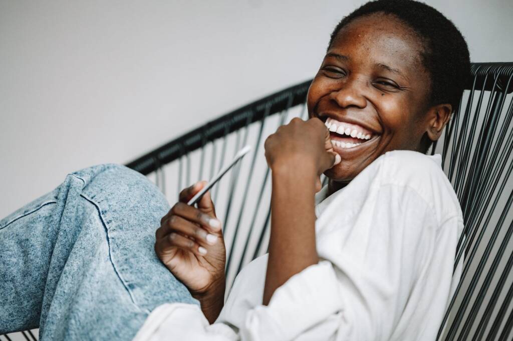 Woman smiling confidently after dental care at Smile Design Cascade Heights in Atlanta, GA